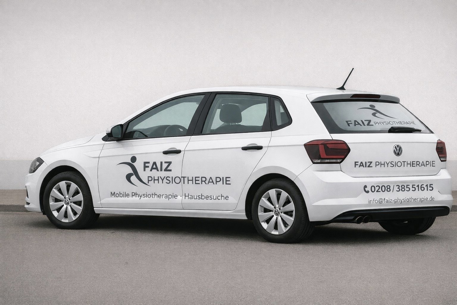 White Volkswagen vehicle wrapped with FAIZ Physiotherapie branding and contact information displayed on both sides